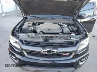 2019 Chevrolet Colorado 2WD Z71 with VIN 1GCGSDEN1K1314774, listed as a Copart auction lot 77212044 with 74,689 mi miles and Salvage Title. Bid and sale history available at carsss.com. Image 11.