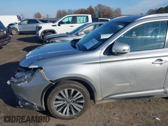 2020 Mitsubishi Outlander ES with VIN JA4AZ3A32LZ018238, listed as a IAAI auction lot 41129342 with 142,946 mi miles and . Bid and sale history available at DreamBid. Image 17.