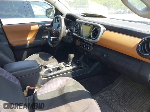 2017 Toyota Tacoma SR5 z VIN 3TMAZ5CN1HM026355, wystawiony jako IAAI lot #42060428 z przebiegiem 165 096 mil mil oraz . Historia ofert i sprzedaży dostępna na DreamBid. Obrazek 5.