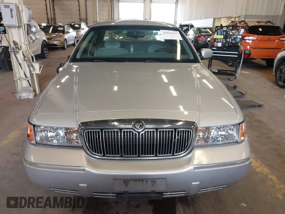 2000 Mercury Grand Marquis LS z VIN 2MEFM75W0YX736324, wystawiony jako IAAI lot #41865927 z przebiegiem 136 886 mil mil oraz . Historia ofert i sprzedaży dostępna na DreamBid. Obrazek 12.