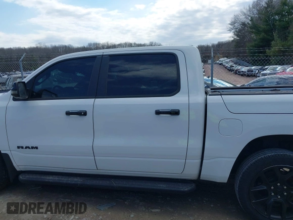 2023 Ram 1500 Laramie with VIN 1C6SRFJT8PN520610, listed as a IAAI auction lot 41898526 with 23,605 mi miles and . Bid and sale history available at DreamBid. Image 14.