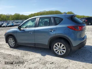 2016 Mazda CX-5 Sport with VIN JM3KE4BY8G0745522, listed as a Copart auction lot 56621825 with 98,757 mi miles and Salvage title. Bid and sale history available at DreamBid. Image 2.