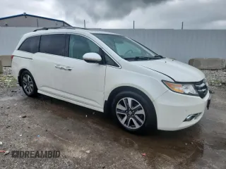 2014 Honda Odyssey Touring with VIN 5FNRL5H95EB083772, listed as a Copart auction lot 56713525 with 215,833 mi miles and Salvage title. Bid and sale history available at DreamBid. Image 4.
