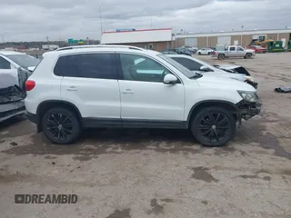 2016 Volkswagen Tiguan S with VIN WVGBV7AX0GW550784, listed as a IAAI auction lot 41817544 with 109,246 mi miles and . Bid and sale history available at DreamBid. Image 14.