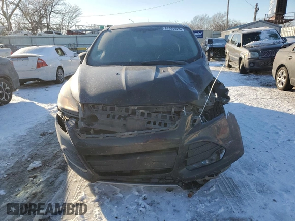 2014 Ford Escape SE z VIN 1FMCU9G95EUA94916, wystawiony jako Copart lot #41660525 z przebiegiem 146 941 mil mil oraz Szkoda całkowita • Salvage title. Historia ofert i sprzedaży dostępna na DreamBid. Obrazek 5.