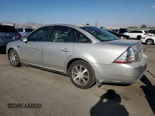 2008 Ford Taurus SEL with VIN 1FAHP24W98G107727, listed as a Copart auction lot 71554324 with 202,777 mi miles and Salvage Title. Bid and sale history available at carsss.com. Image 2.