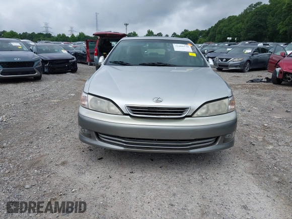2001 Lexus ES 300 z VIN JT8BF28G910291019, wystawiony jako IAAI lot #42488530 z przebiegiem 170 168 mil mil oraz . Historia ofert i sprzedaży dostępna na DreamBid. Obrazek 12.