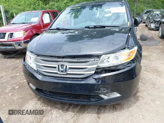 2012 Honda Odyssey Touring with VIN 5FNRL5H91CB121950, listed as a IAAI auction lot 42456620 with 200,831 mi miles and . Bid and sale history available at DreamBid. Image 12.