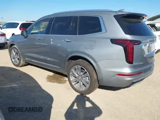 2025 Cadillac XT6 FWD Premium Luxury with VIN 1GYKPCRS3SZ118384, listed as a IAAI auction lot 41962391 with 6,946 mi miles. Bid and sale history available at carsss.com. Image 3.