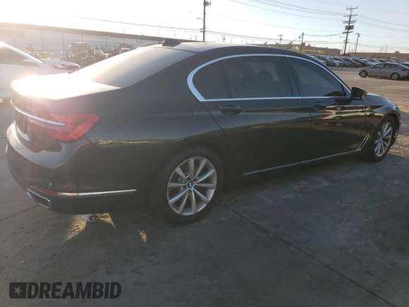 2016 BMW 7 Series 740i with VIN WBA7E2C59GG504533, listed as a Copart auction lot 77122283 with 68,209 mi miles. Bid and sale history available at carsss.com. Image 3.