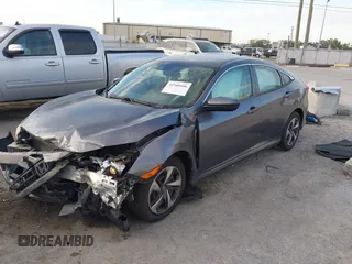 2019 Honda Civic Sedan LX with VIN 19XFC2F60KE018100, listed as a IAAI auction lot 41908486 with 124,357 mi miles. Bid and sale history available at carsss.com. Image 17.
