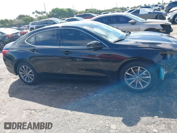 2020 Acura TLX w/Technology Pkg with VIN 19UUB1F57LA016345, listed as a IAAI auction lot 41661004 with 66,501 mi miles. Bid and sale history available at carsss.com. Image 14.