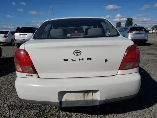 2002 Toyota ECHO with VIN JTDBT123020215409, listed as a Copart auction lot 71653384 with 265,969 mi miles and Salvage Title. Bid and sale history available at carsss.com. Image 6.