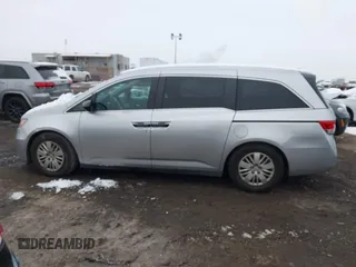 2014 Honda Odyssey LX with VIN 5FNRL5H22EB080346, listed as a IAAI auction lot 41282783 with 101,000 mi miles and . Bid and sale history available at carsss.com. Image 14.