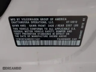 2013 Volkswagen Passat TDI SEL Premium with VIN 1VWCN7A39DC011421, listed as a IAAI auction lot 42042189 with 141,670 mi miles. Bid and sale history available at carsss.com. Image 9.