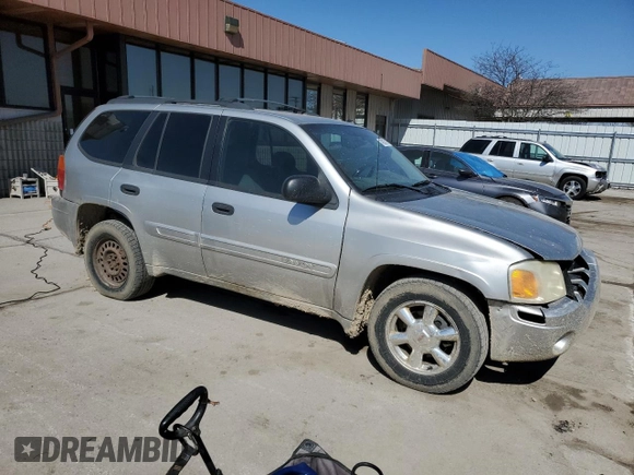 2005 GMC Envoy SLE with VIN 1GKDT13S652171203, listed as a Copart auction lot 49087815 with 292,815 mi miles and Salvage Title. Bid and sale history available at carsss.com. Image 4.