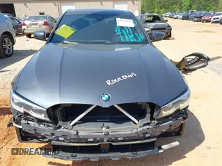 2019 BMW 3 Series 330i with VIN WBA5R1C5XKFH00567, listed as a IAAI auction lot 42076068 with 160,576 mi miles and . Bid and sale history available at DreamBid. Image 12.