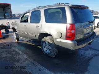 2012 Chevrolet Tahoe LS with VIN 1GNSKAE05CR278255, listed as a IAAI auction lot 41054601 with 205,470 mi miles and . Bid and sale history available at DreamBid. Image 3.