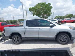 2020 Honda Ridgeline Sport with VIN 5FPYK3F19LB024180, listed as a IAAI auction lot 42399195 with 42,129 mi miles and . Bid and sale history available at DreamBid. Image 14.