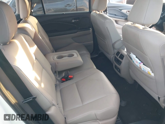 2019 Honda Pilot Touring 8-Passenger with VIN 5FNYF5H97KB005203, listed as a IAAI auction lot 41399930 with 47,267 mi miles and . Bid and sale history available at DreamBid. Image 8.