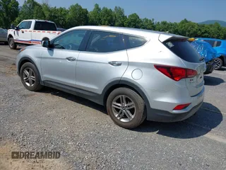2018 Hyundai Santa Fe 2.4L z VIN 5XYZTDLB1JG546708, wystawiony jako IAAI lot #42399917 z przebiegiem 131 932 mil mil oraz . Historia ofert i sprzedaży dostępna na DreamBid. Obrazek 3.