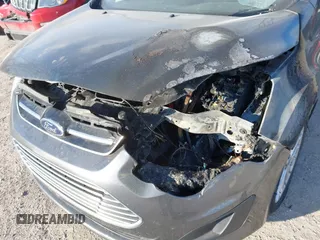 2016 Ford C-Max SE with VIN 1FADP5AU6GL116636, listed as a IAAI auction lot 41369977 with Not Provided miles and . Bid and sale history available at DreamBid. Image 6.