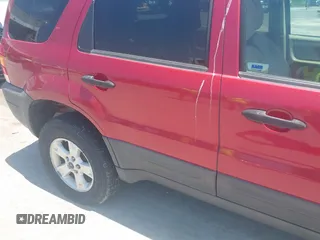2006 Ford Escape XLT with VIN 1FMCU03156KC06607, listed as a IAAI auction lot 42564636 with 183,896 mi miles and . Bid and sale history available at DreamBid. Image 6.