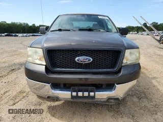2005 Ford F-150 XLT with VIN 1FTRX12565KB21614, listed as a Copart auction lot 61488075 with 202,747 mi miles and Salvage title. Bid and sale history available at DreamBid. Image 5.