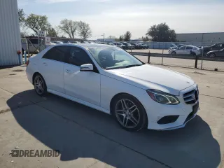 2015 Mercedes-Benz E-Class E 350 Sport with VIN WDDHF5KBXFB125393, listed as a Copart auction lot 50198345 with 105,016 mi miles and Salvage Title. Bid and sale history available at carsss.com. Image 4.