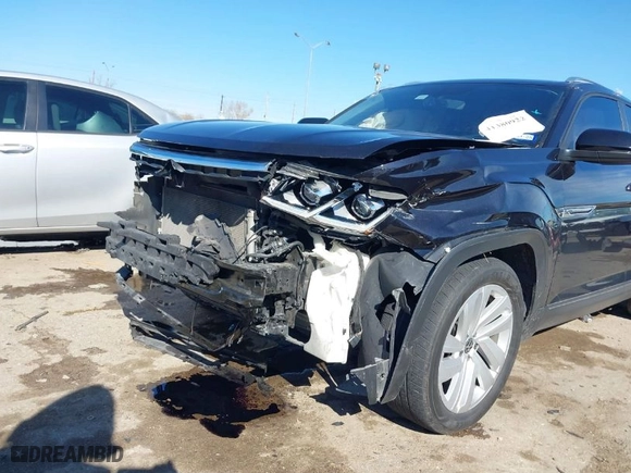 2023 Volkswagen Atlas Cross Sport 3.6L V6 SE w/Technology with VIN 1V2WE2CA4PC205727, listed as a IAAI auction lot 41380922 with 74,482 mi miles. Bid and sale history available at carsss.com. Image 6.
