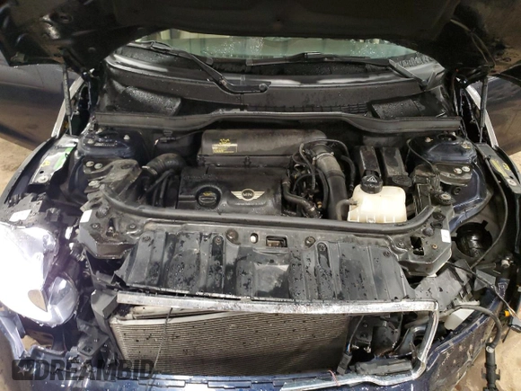 2013 MINI Countryman S ALL4 with VIN WMWZC5C5XDWM16477, listed as a Copart auction lot 51666385 with 112,383 mi miles and Salvage title. Bid and sale history available at DreamBid. Image 13.