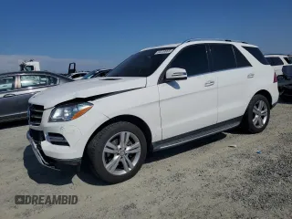 2015 Mercedes-Benz M 350 with VIN 4JGDA5JB6FA552077, listed as a Copart auction lot 60239965 with 87,265 mi miles and Salvage title. Bid and sale history available at DreamBid. Image 1.
