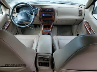1999 Mercury Mountaineer z VIN 4M2DU52P9XUJ10152, wystawiony jako Copart lot #76283584 z przebiegiem 32 199 mil mil oraz Tytuł czysty. Historia ofert i sprzedaży dostępna na DreamBid. Obrazek 8.