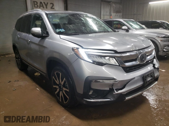 2021 Honda Pilot Elite with VIN 5FNYF6H04MB053008, listed as a Copart auction lot 87802955 with 70,737 mi miles and Salvage Title. Bid and sale history available at carsss.com. Image 4.