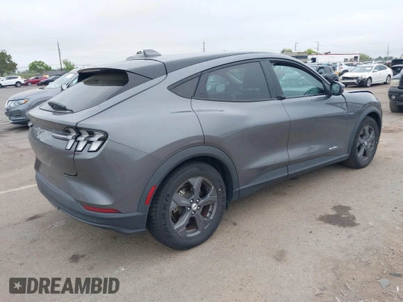 2021 Ford Mustang Mach-E Select z VIN 3FMTK1RM8MMA18120, wystawiony jako IAAI lot #42077686 z przebiegiem 71 626 mil mil oraz . Historia ofert i sprzedaży dostępna na DreamBid. Obrazek 4.