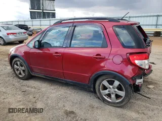 2012 Suzuki SX4 Crossover with VIN JS2YB5A35C6300305, listed as a Copart auction lot 86278834 with 113,192 mi miles and Salvage Title. Bid and sale history available at DreamBid. Image 2.