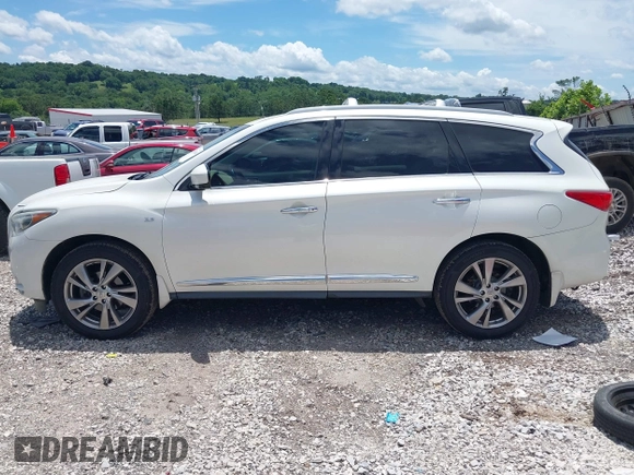 2015 Infiniti QX60 with VIN 5N1AL0MM7FC527660, listed as a IAAI auction lot 42478349 with 146,649 mi miles and . Bid and sale history available at DreamBid. Image 14.