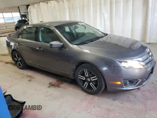 2012 Ford Fusion SEL with VIN 3FAHP0JA1CR281869, listed as a Copart auction lot 52486365 with 124,312 mi miles and Salvage Title. Bid and sale history available at carsss.com. Image 4.