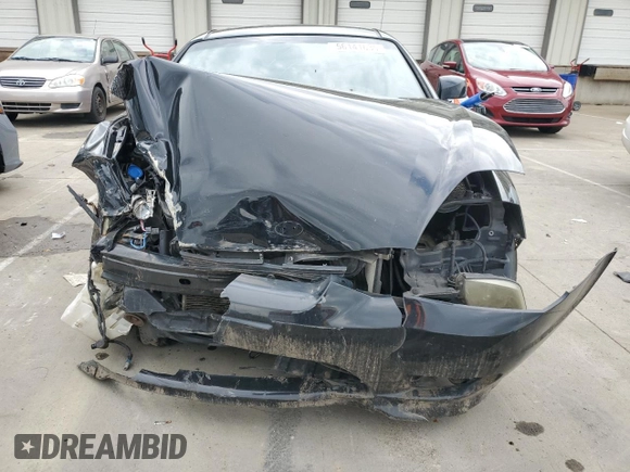 2006 Hyundai Tiburon GT z VIN KMHHN65F66U215304, wystawiony jako Copart lot #56141635 z przebiegiem 149 118 mil mil oraz Szkoda całkowita • Salvage title. Historia ofert i sprzedaży dostępna na DreamBid. Obrazek 5.