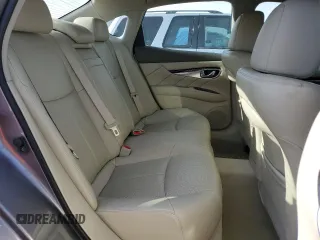 2014 Infiniti M37 with VIN JN1BY1AP2EM260051, listed as a Copart auction lot 87276884 with 101,899 mi miles and Salvage Title. Bid and sale history available at carsss.com. Image 10.