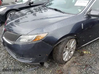 2014 Lincoln MKS EcoBoost with VIN 1LNHL9FT4EG607092, listed as a IAAI auction lot 41483964 with 89,624 mi miles. Bid and sale history available at carsss.com. Image 6.