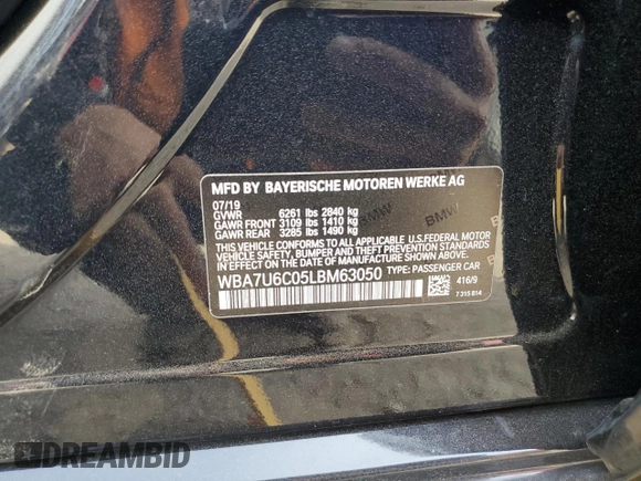 2020 BMW 7 Series with VIN WBA7U6C05LBM63050, listed as a Copart auction lot 71823944 with Not provided miles and Salvage title. Bid and sale history available at DreamBid. Image 12.
