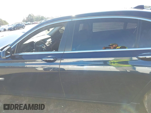 2012 BMW 7 Series 750Li xDrive with VIN WBAKC8C52CC436399, listed as a IAAI auction lot 41214440 with 122,532 mi miles and . Bid and sale history available at DreamBid. Image 14.