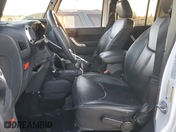2015 Jeep Wrangler Unlimited Rubicon with VIN 1C4BJWFG5FL659017, listed as a Copart auction lot 84435034 with 69,915 mi miles and Salvage Title. Bid and sale history available at carsss.com. Image 7.