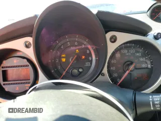 2013 Nissan 370Z z VIN JN1AZ4EH4DM383023, wystawiony jako Copart lot #88204985 z przebiegiem 138 112 mil mil oraz Szkoda całkowita • Salvage title. Historia ofert i sprzedaży dostępna na DreamBid. Obrazek 9.
