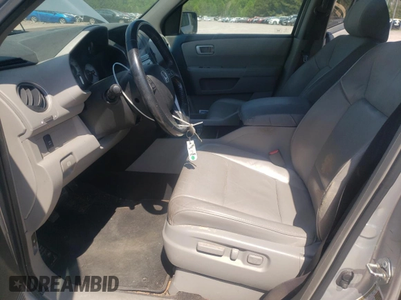 2011 Honda Pilot EX-L with VIN 5FNYF4H57BB050486, listed as a Copart auction lot 54008245 with 62,793 mi miles and Salvage Title. Bid and sale history available at DreamBid. Image 7.