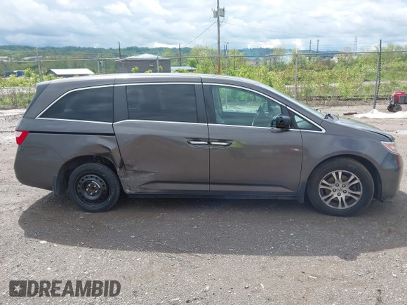 2012 Honda Odyssey EX-L with VIN 5FNRL5H68CB060487, listed as a IAAI auction lot 42176223 with 234,078 mi miles and . Bid and sale history available at DreamBid. Image 14.