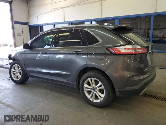 2019 Ford Edge SEL with VIN 2FMPK4J95KBB76844, listed as a Copart auction lot 59323925 with 122,326 mi miles and Salvage title. Bid and sale history available at DreamBid. Image 2.