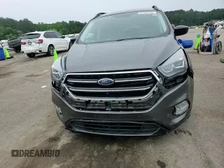 2017 Ford Escape SE z VIN 1FMCU9GD1HUB35003, wystawiony jako Copart lot #56502385 z przebiegiem 74 409 mil mil oraz Szkoda całkowita • Salvage title. Historia ofert i sprzedaży dostępna na DreamBid. Obrazek 14.