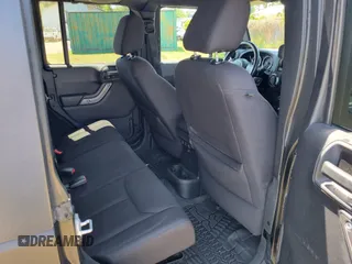 2014 Jeep Wrangler Unlimited Sport with VIN 1C4HJWDG4EL159619, listed as a IAAI auction lot 42176313 with 79,715 mi miles and . Bid and sale history available at DreamBid. Image 11.
